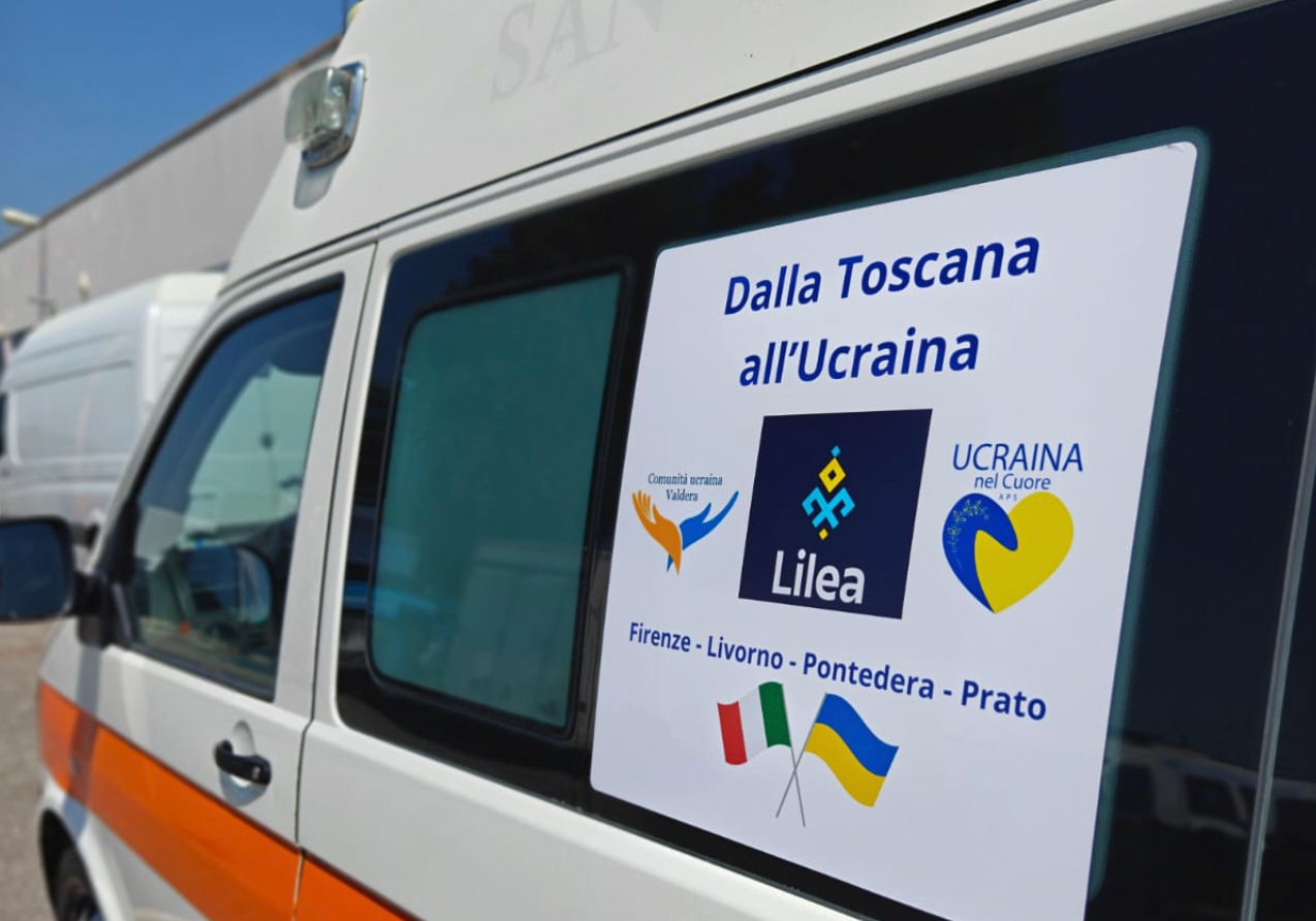 Ambulance with Lilea logo, among others, on the window