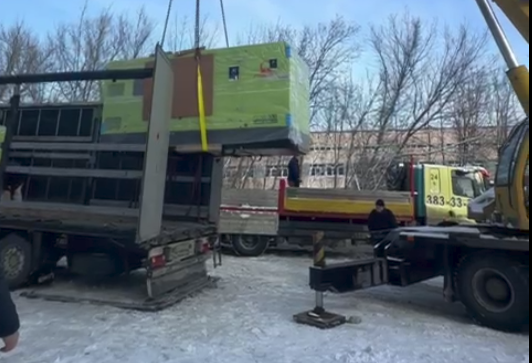 Generators being loaded on a truck